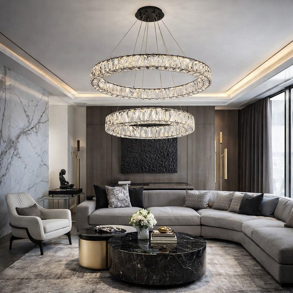 Modern living room with Monroe chandelier by Elegant, sofa, and coffee table.