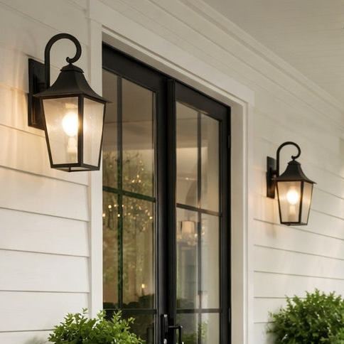 Rasmussen 1-Light Seeded Glass Armed Wall Lantern in Black by TransGlobe