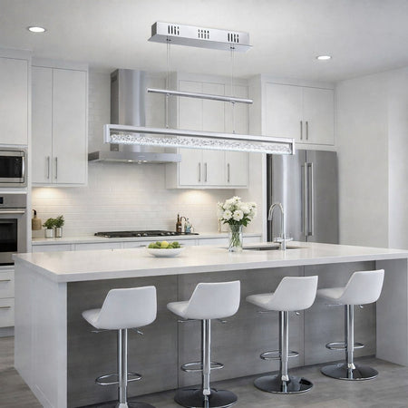 Modern kitchen with white island, stools, and stainless steel appliances.