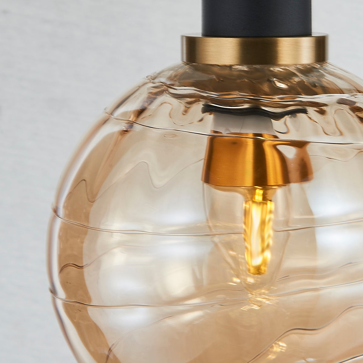 Gem Collection 1-Light Pendant with Amber Glass Black and Brushed Brass