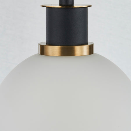 Gem Collection 1-Light Pendant with White Glass Black and Brushed Brass