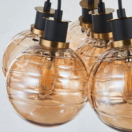Gem Collection 7-Light Pendant with Amber Glass Black and Brushed Brass