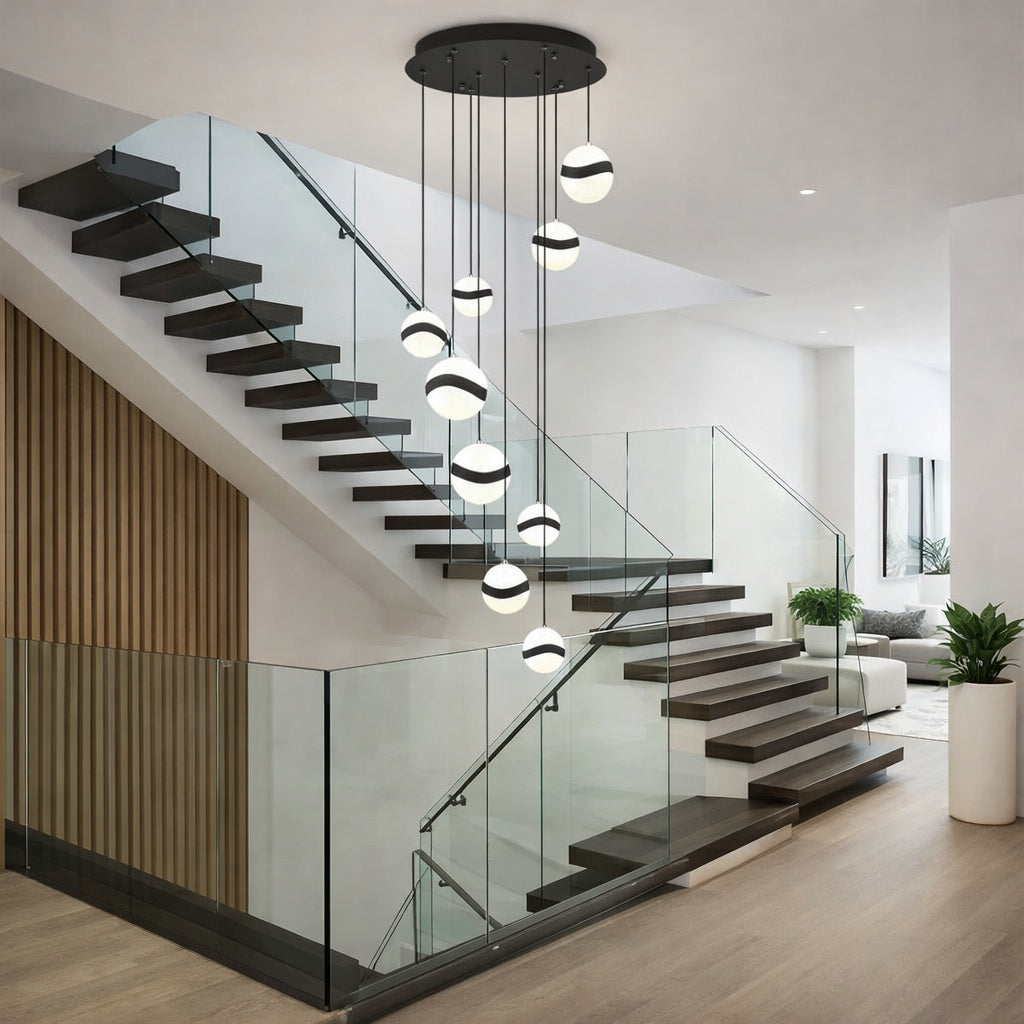 Elegant Mystyke 9 light LED pendant finished in sleek black by Kendal