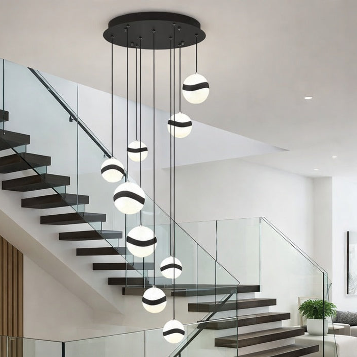 Elegant Mystyke 9 light LED pendant finished in sleek black by Kendal