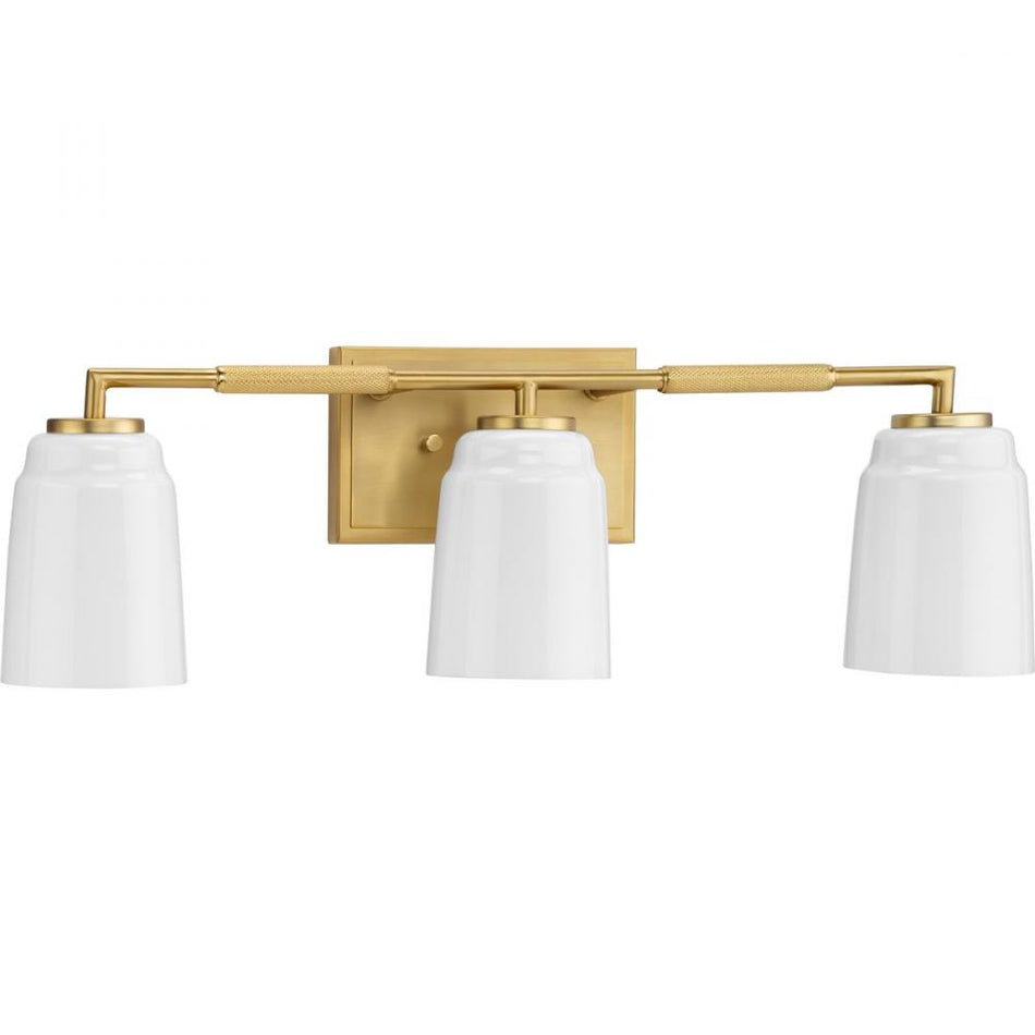 Spenser Collection Three-Light Brushed Gold Industrial Vanity Light by Progress