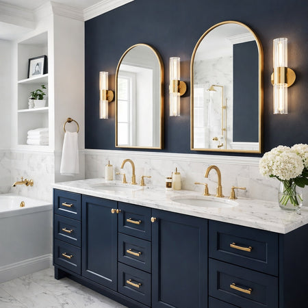 Odette collection tubular vanity light in Aged Gold Brass by Matteo